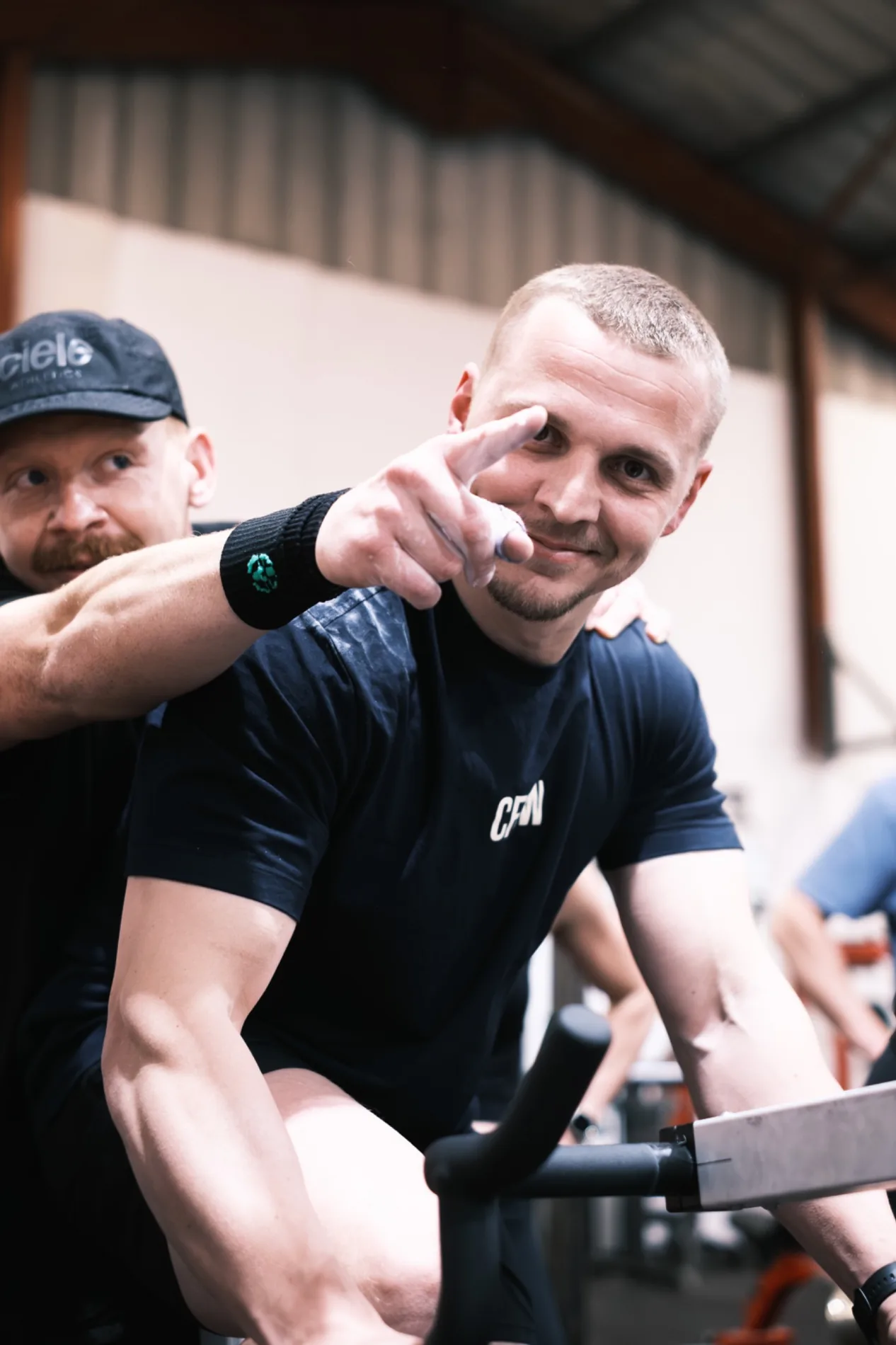 CrossFit Shearwater member training on a bike erg